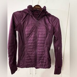 Lululemon jacket. Great color and fit. Warm and lightweight.